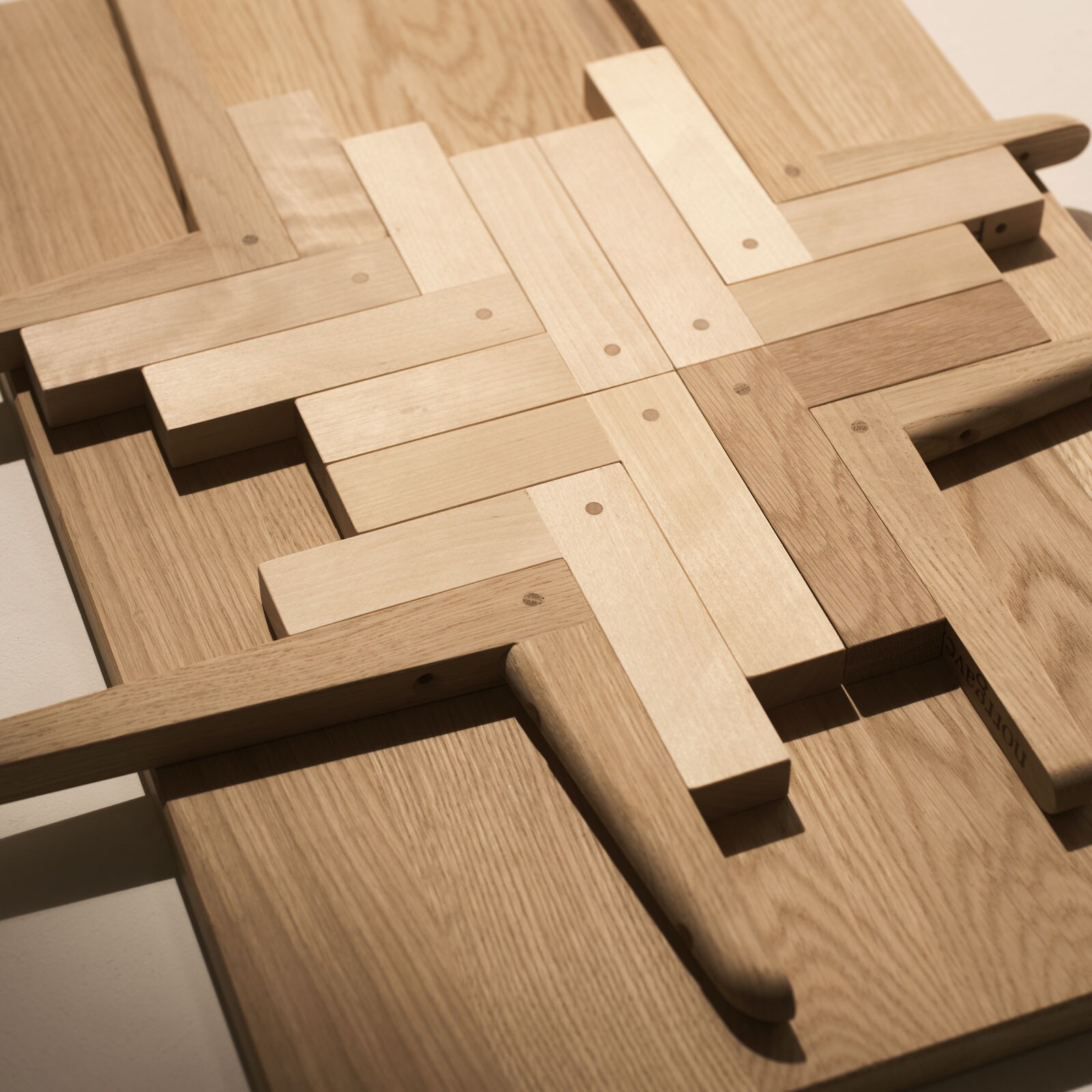 Wooden brackets forming a pattern